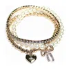 Mimi Wholesale Women's Three Piece Pearl Beaded Stretchy Bracelet In Gold In Gold