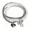 Mimi Wholesale Women's Three Piece Pearl Beaded Stretchy Bracelet In Silver In Metallic