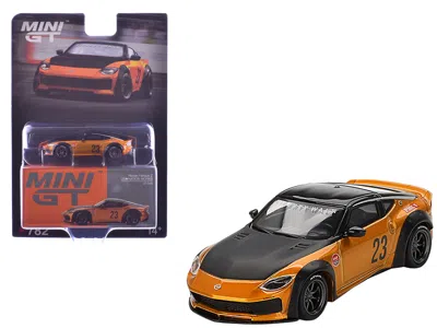 Mini Gt Nissan Fairlady Z #23 "lb-nation Works" Lb Gold Metallic With Matt Black Hood And Black Top Limited  In Orange