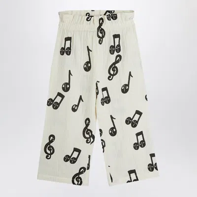 MINI RODINI WIDE WHITE TROUSERS WITH MUSICAL NOTES