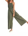 Miou Muse Smocked Halter Jumpsuit In Olive In Green