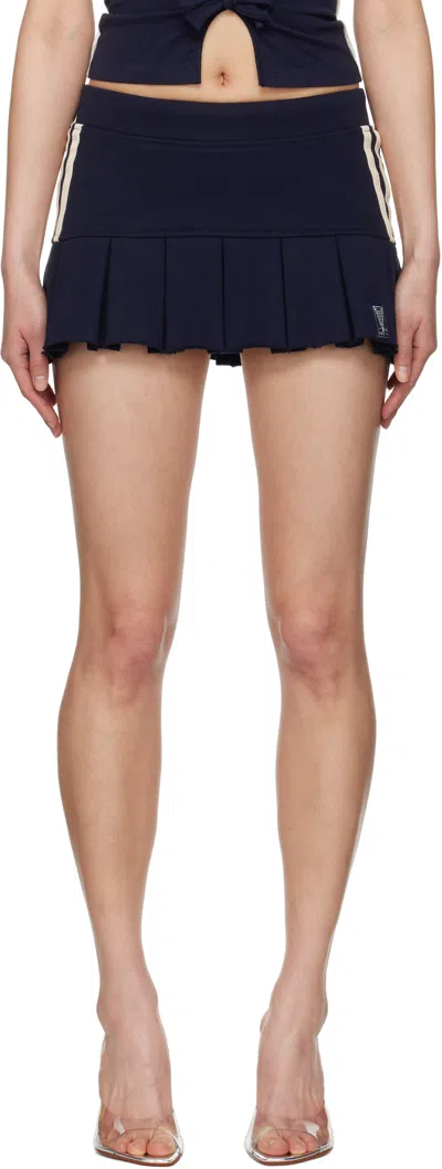 MISBHV NAVY VARSITY PLEATED MINISKIRT