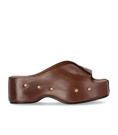 Miss Olivia Carola Coffee Mules In Brown