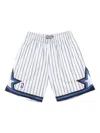 Mitchell & Ness Men's Cream Orlando Magic 1993/94 Hardwood Classics Team Color Swingman Shorts