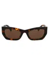 Miu Miu Eyewear Rectangular Frame Sunglasses In Vau06b Honey Havana