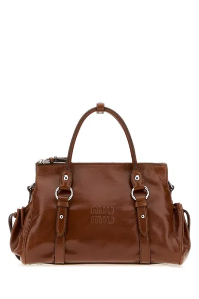 Miu Miu Logo-embossed Leather Tote Bag In Brown