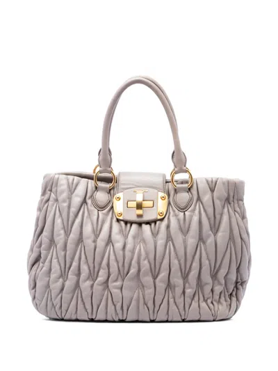 Pre-owned Miu Miu 2010 Matelasse Nappa Turnlock Tote Bag In Neutrals