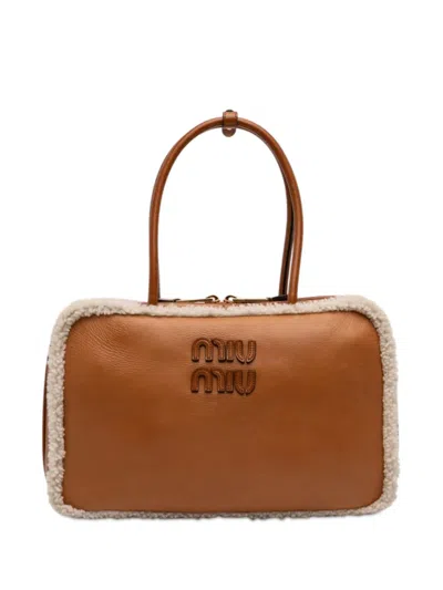 Pre-owned Miu Miu 2010-2026 Large Shearling Trimmed Calfskin Logo Beau Shoulder Bag In Brown