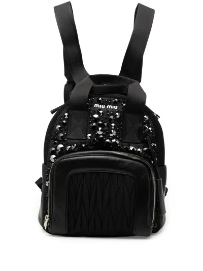 Pre-owned Miu Miu 2010-2026 Leather Trimmed Matelasse Crystal Embellished Nylon Backpack In Black