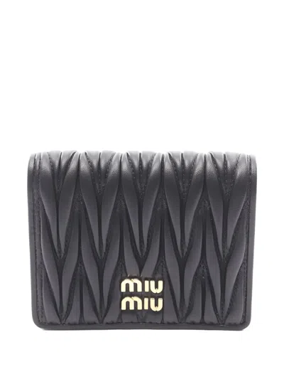Pre-owned Miu Miu 2020s Matelassé Bi-fold Leather Wallet In Black