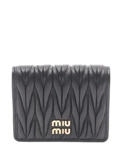 Pre-owned Miu Miu 2020s Matelasse Leather Bi-fold Wallet In Black
