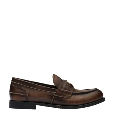 MIU MIU MIU MIU LOGO DETAILED SLIP-ON PENNY LOAFERS