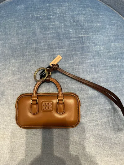 Miu Miu Arcadie Leather Trick In Brown
