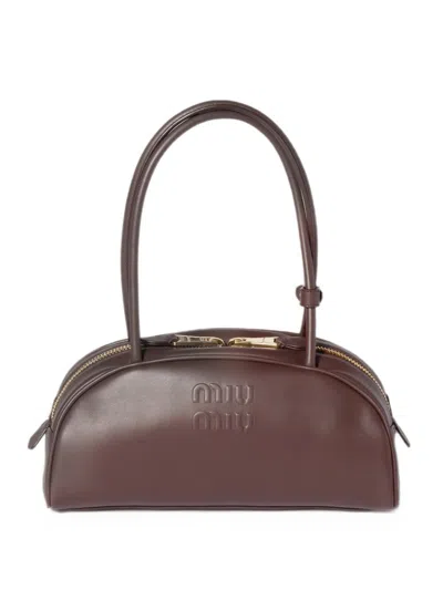 Miu Miu Beau Clutch Bag With Embossed Logo In Brown