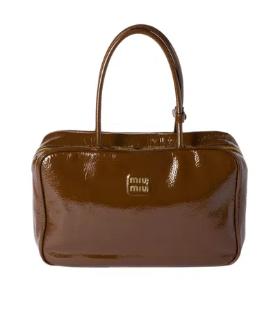 Miu Miu Beau Naplak Patent Leather Bag In Brown