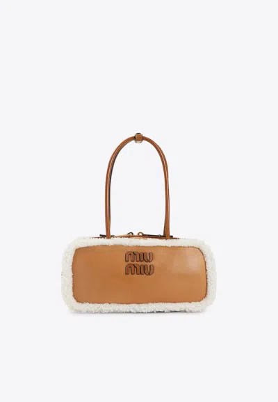 Miu Miu Beau Shearling-trimmed Shoulder Bag In Brown