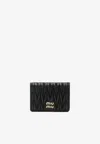 Miu Miu Bi-fold Leather Wallet In Black