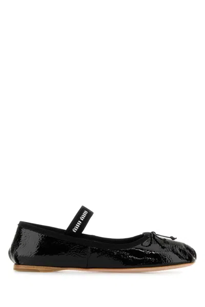 Miu Miu Logo-printed Bow Detailed Ballerina Shoes In Animal Print