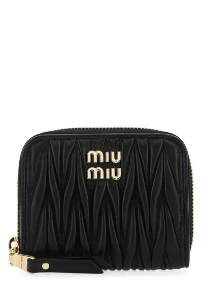 Miu Miu Quilted Leather Coin Purse With Wrist Strap In Black