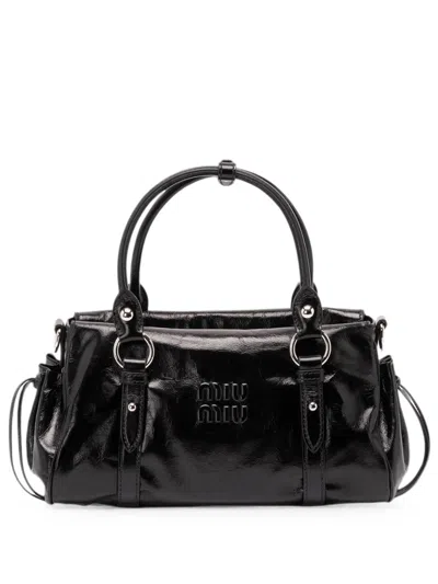 Miu Miu Embossed Logo Shiny Leather Top Handle Bag In Black