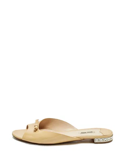 Pre-owned Miu Miu Bow-detail Crystal-embellished Slides In Neutral