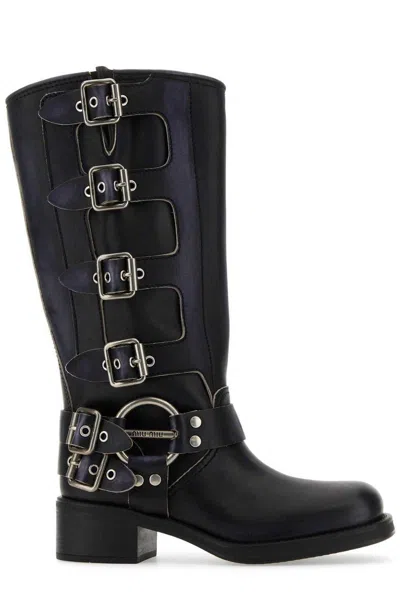 Miu Miu Buckle-detailed Round Toe Boots In Nero