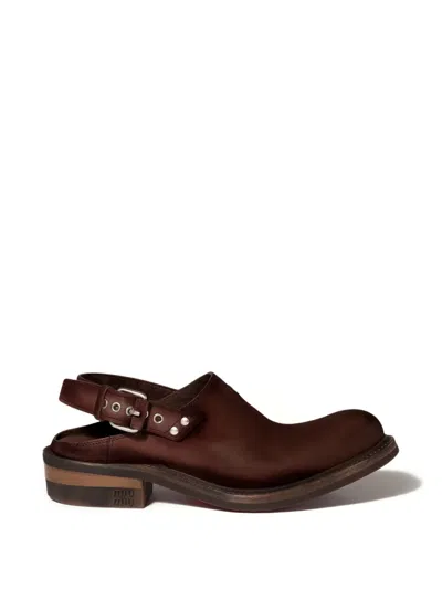 Miu Miu Buckle Mules In Brown