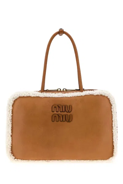 Miu Miu Camel Leather Beau Handbag In Brown