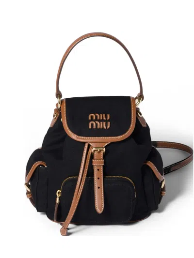 MIU MIU CANVAS AND LEATHER BACKPACK