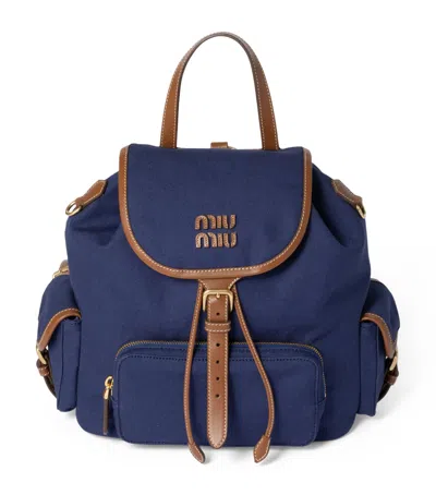 Miu Miu Canvas And Leather Backpack In Blue