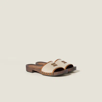MIU MIU CANVAS AND LEATHER CLOGS