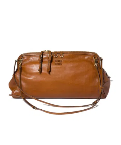 Miu Miu Caprice Leather Clutch In Brown