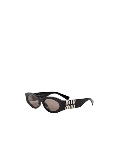 Miu Miu Cat's Eye Light Tea Lens Sunglasses In Black