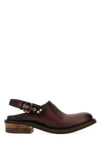 Miu Miu Chocolate Leather Foule Slippers In Black