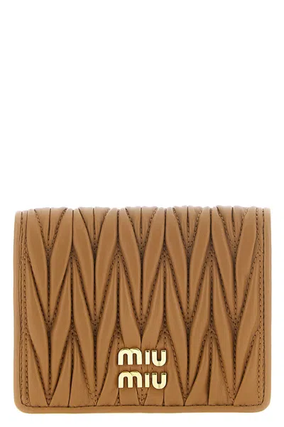 Miu Miu Compact Matelassé Nappa Wallet In Brown