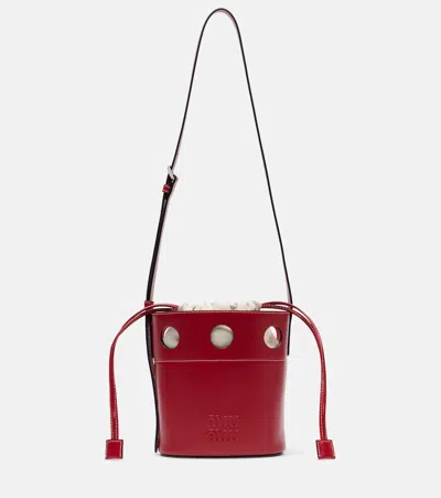 Miu Miu Cutout Leather Bucket Bag In Red