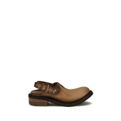 Miu Miu Distressed Calf Leather Mule In Brown