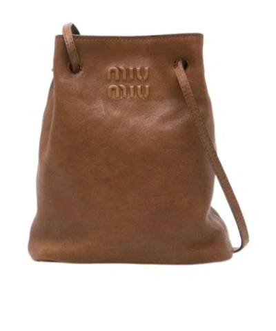 Miu Miu Drawstring Shoulder Bag In Brown
