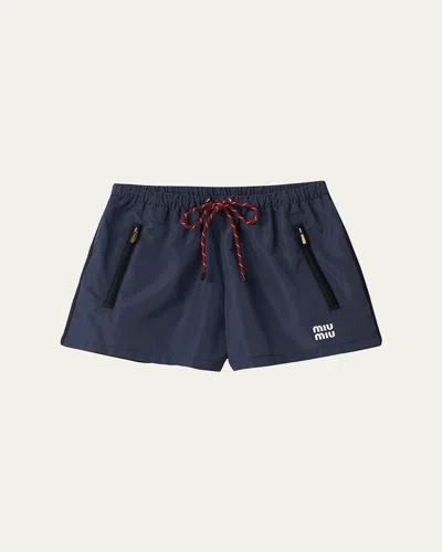Miu Miu Drawstring Zip-pocket Shorts In Bleu