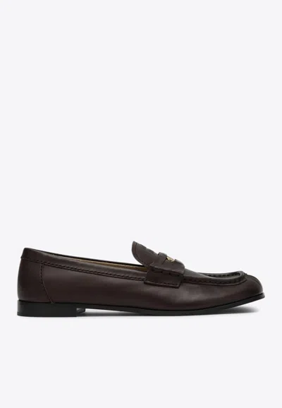 Miu Miu Embossed-coin Leather Loafers In Brown
