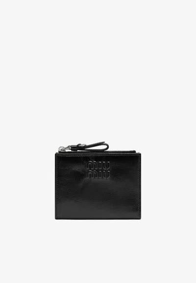 Miu Miu Embossed Logo Nappa Leather Zip Wallet In Black