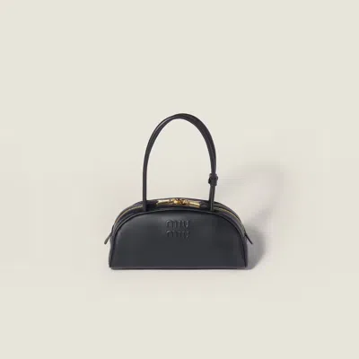 Miu Miu Embossed Logo Top Handle Bag In Black