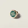 Miu Miu Enameled Metal Logo Brooch In Gold