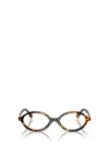 Miu Miu Oval Sunglasses In Brown