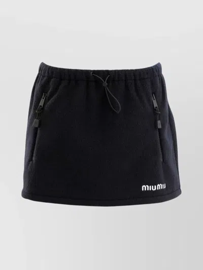 MIU MIU FLEECE MINISKIRT WITH DRAWSTRING WAIST AND ZIP POCKETS