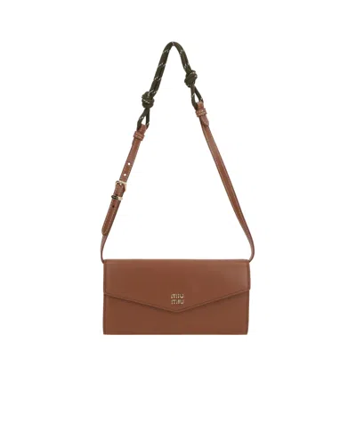 Miu Miu Flip Shoulder Bag In Brown