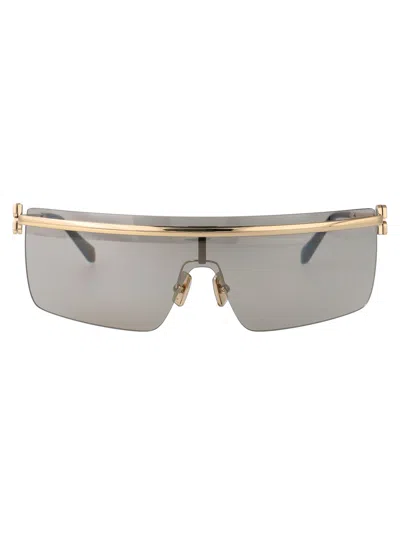 Miu Miu Sunglasses In Zvn1i2 Pale Gold