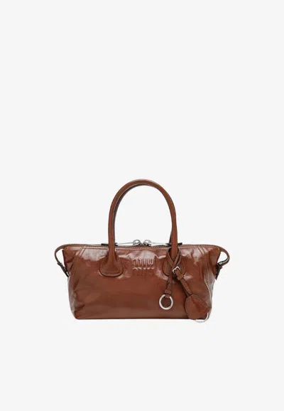 Miu Miu Glossy Vintage Leather Shoulder Bag In Brown
