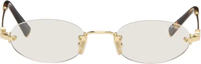 Miu Miu Gold Rimless Oval Glasses