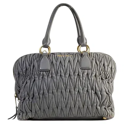 Pre-owned Miu Miu Grey Matelassé Leather Bauletto Bag With Gold Hardware In Gray